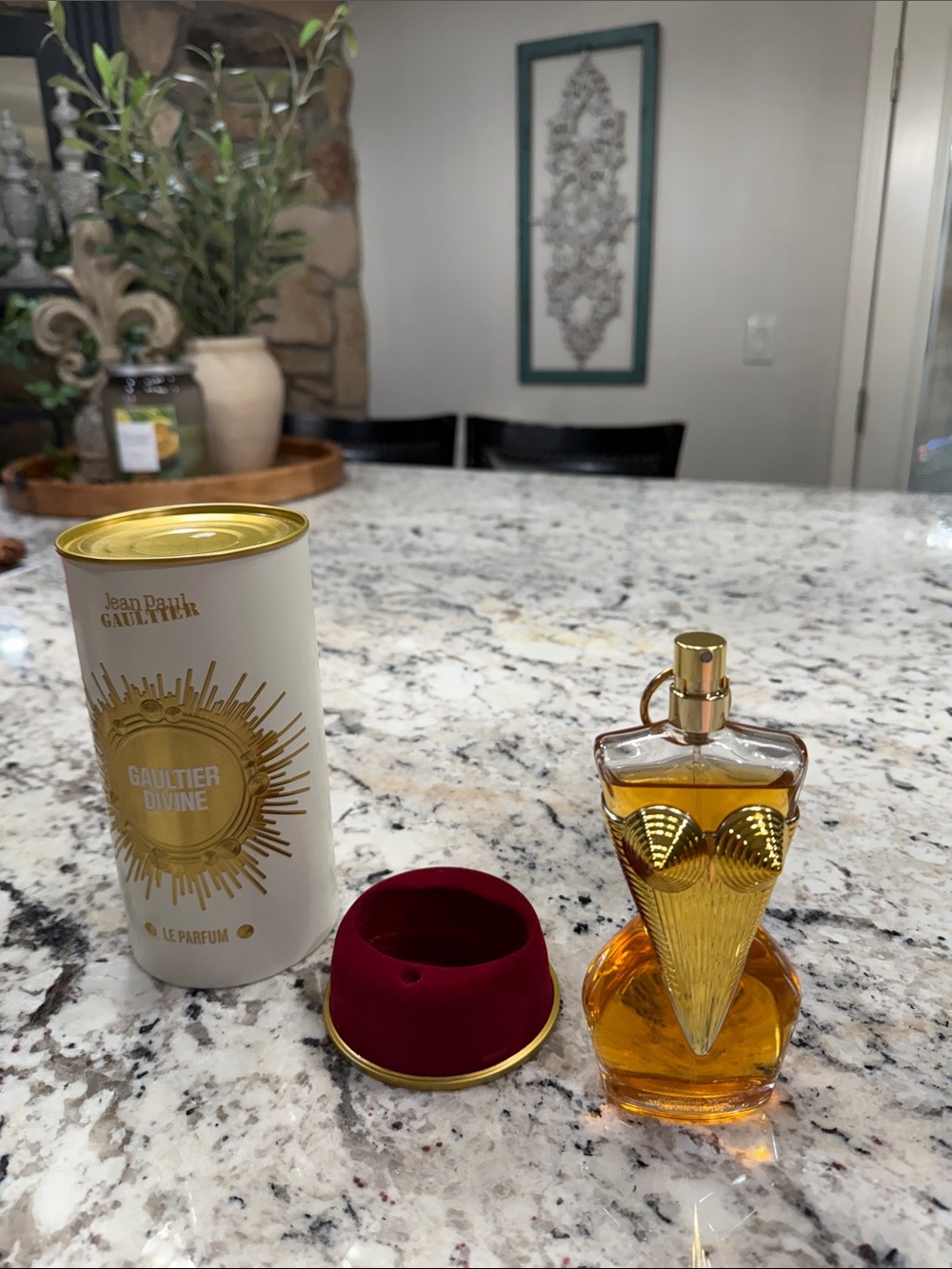 Jean Paul Gaultier gold and deep red collectible perfume decanter